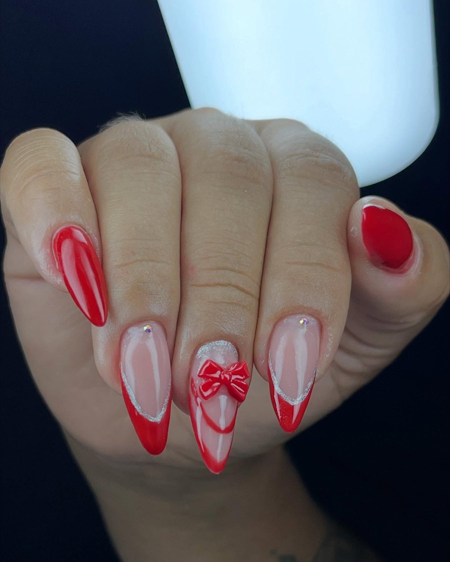 Unhas vermelhas com laço 3D